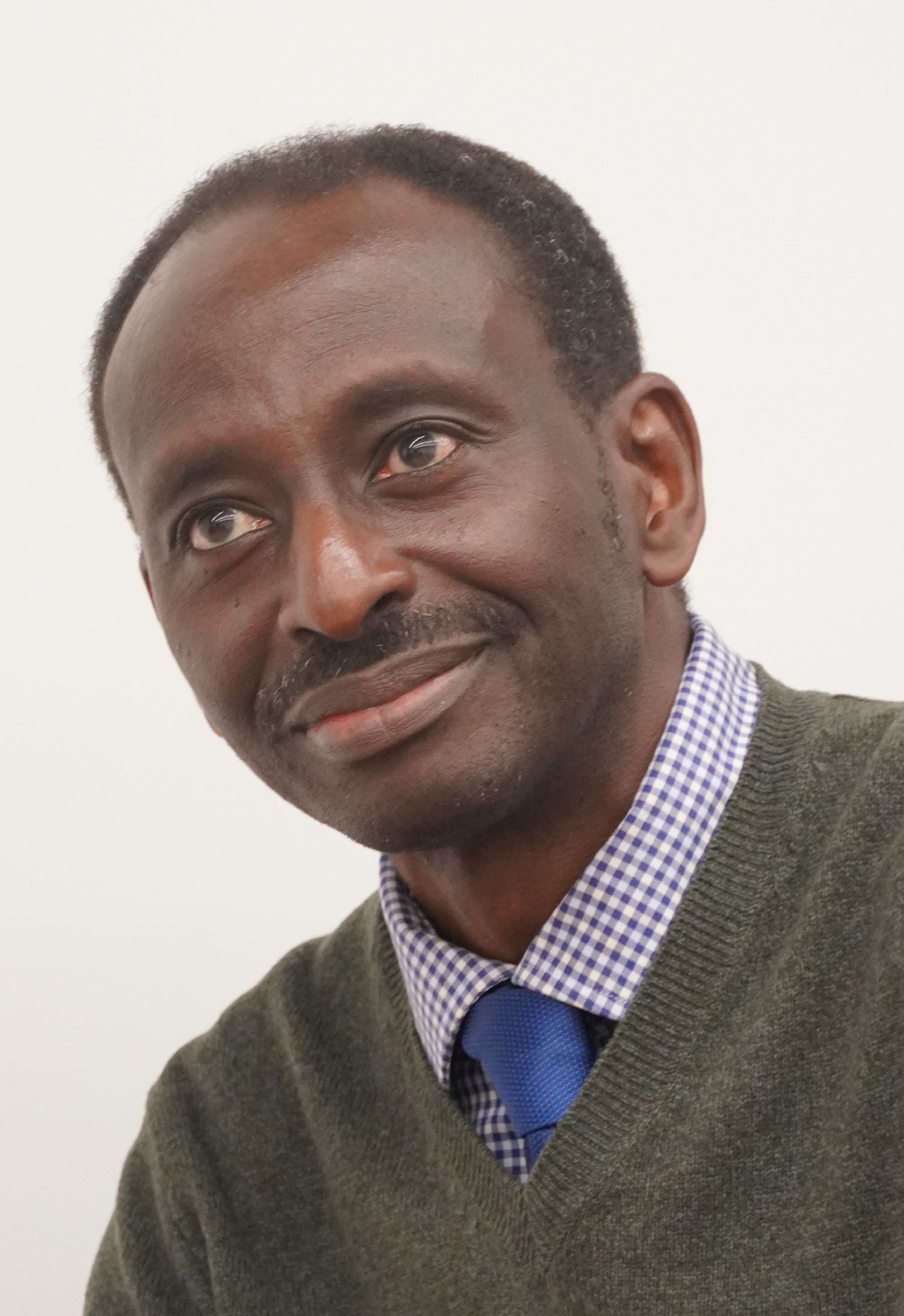 Headshot of James Tibenderana, Chief Executive of Malaria Consortium