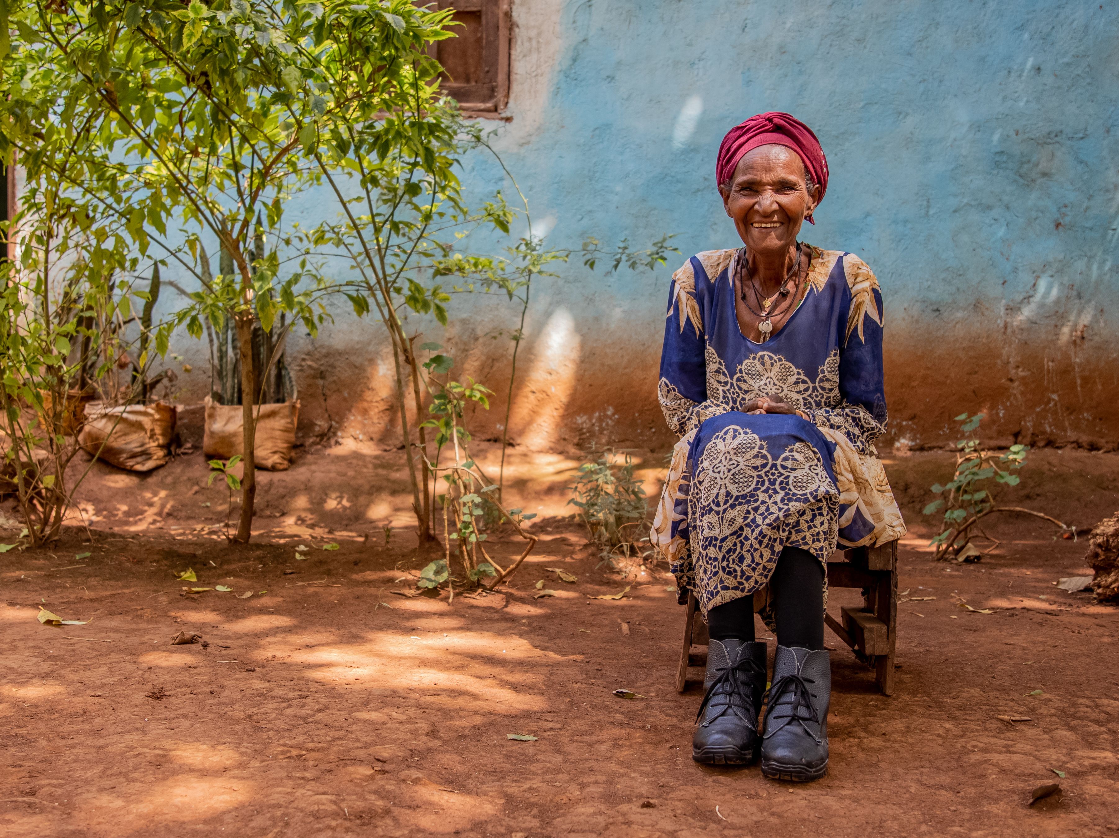 Smiling woman wearing purple boots